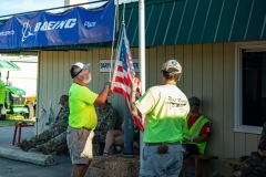 Kirby and Ryan raise the colors