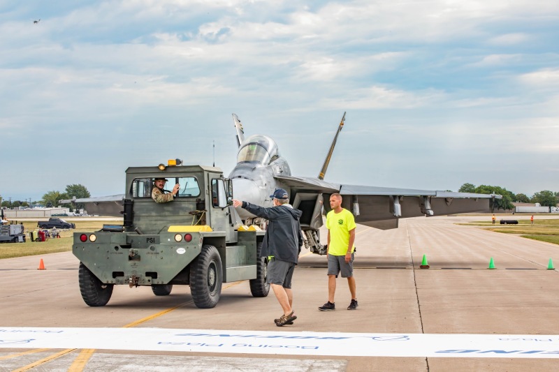 Gus-tells-them-where-to-park-the-F-18-